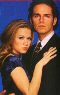 Joie Lenz as 'Michelle' and Paul Anthony Stewart as 'Danny'